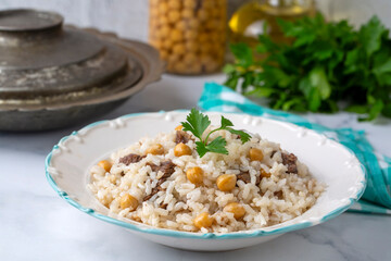Traditional Turkish food; Roasted meat on rice (Turkish name; pilav üstü kavurma, kurban kavurma, nohutlu etli pilav)