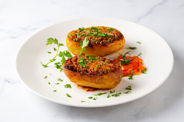 Traditional Turkish food; baked potato dish with minced meat, Turkish name; Patates karniyarik