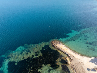 Obraz premium Cesmealti - Urla - Izmir - Turkey, View on ''Bride Rock'' or ''Sail Rock''. Gelinkaya