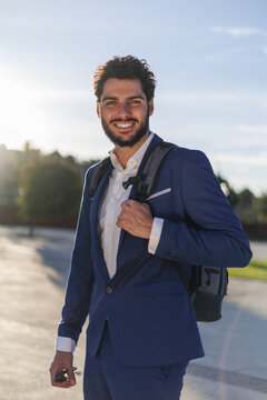 Handsome businessman portrait at sunset. Hispanic ethnicity. Millennial generation.