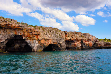 The caves of the ionian Sea side of Santa Maria di Leuca seen from the tourist boat	