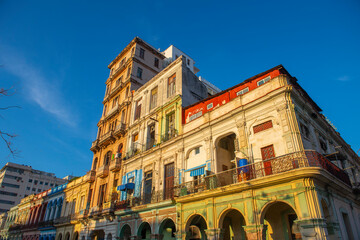 Historic buildings on Paseo del Prado at Calle Genios Street in the morning in Old Havana (La Habana Vieja), Cuba. Old Havana is a World Heritage Site. 
