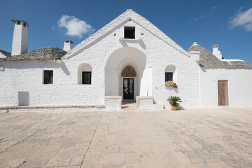 Front view of the sovereign trullo, one of the oldest and most famous buildings of the city of...