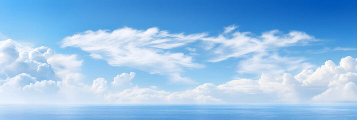 Breathtaking Display of Azure Sky Interspersed with Wispy White Clouds under Sunny Daylight