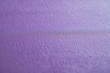 A close-up image showcasing the texture and color of a purple wall background in a raw and artistic...