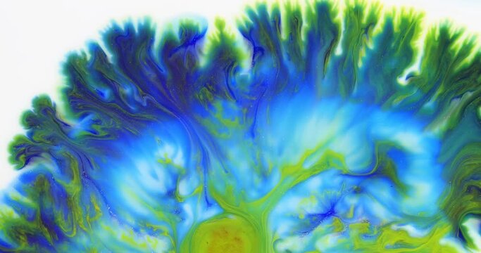 Moving marble texture background. Fluid art of flowing blue and yellow colors on a white background.