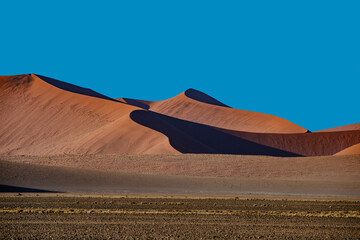 Bleak Curves - Tall Red Sand Dunes in Sossusvlei, Namibia 