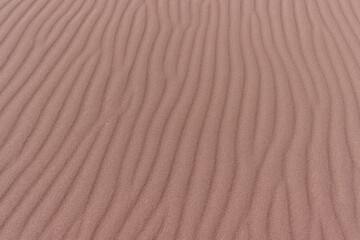 Sand formations with ripples regular pattern.