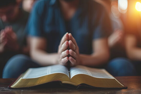 Christian group praying to God with the bible and spreading the gospel. Concept of faith in God