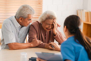 Health insurance service, Young Asian caregiver nurse examine senior man or woman patient at home....