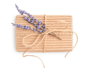 Top view of craft carton recycled gift box tied up with string bow decorated with dried lavender flowers isolated on white background used as zero waste disposable holiday present for birthday