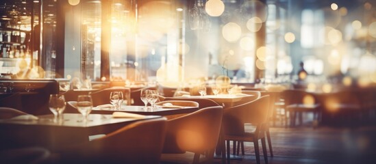 This image showcases a bustling restaurant filled with a multitude of tables and chairs, indicating a high level of activity and customer presence. - obrazy, fototapety, plakaty