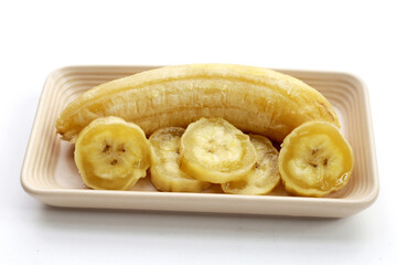 Banana slices on white background.