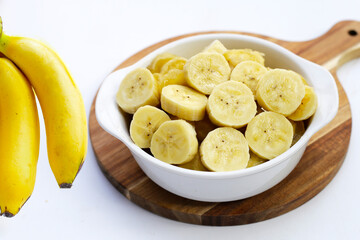 Banana slices on white background.