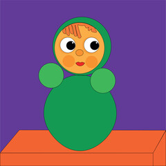 Tumbler, a doll from the time of the USSR. The toy is a souvenir and consists of painted balls. The object has a center of gravity that allows it to maintain balance.