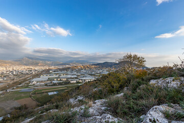 Panoramic shot of the city from the mountain, green landscape of the Turkish area.