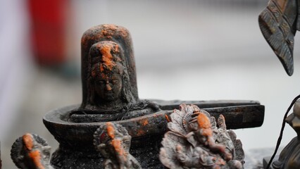 figurine of shivling with god ganesha sculpture