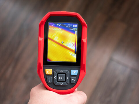 Thermal Imaging of Underfloor Heating. Checking for leakage of the water floor under the laminate