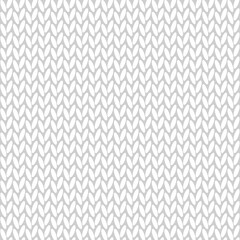 Seamless knitted pattern in white color. Needlework, handwork, needlecraft product. Flat vector print for fabric, wrapping paper, Christmas decorations