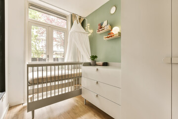 Modern nursery room with crib and natural light