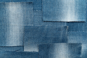 Texture from torn pieces of denim. Jeans texture. Material for sewing clothes