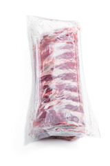 Fresh raw pork ribs in a vacuum package isolated on white