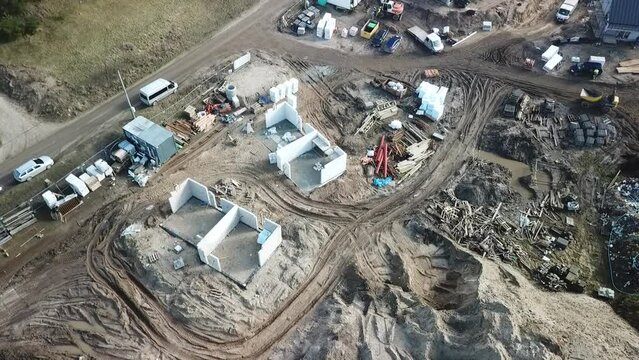 Construction of a modern housing estate in the style of a modern barn