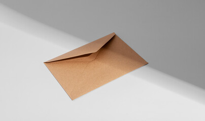 Kraft brown envelope, paper letter, light and shadow