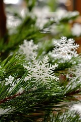 a snowflake on a pine tree