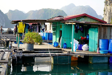 Fototapeta na wymiar Famous floating fishing villages of Vietnam