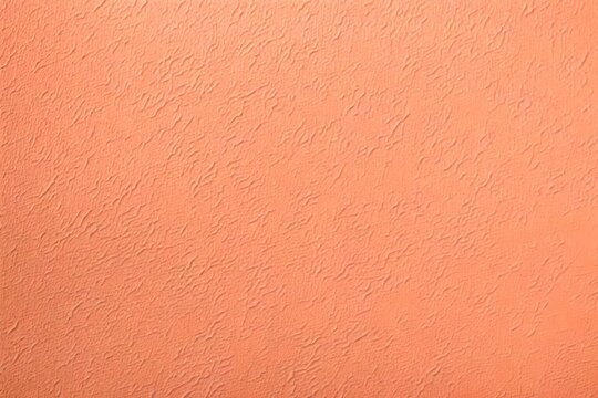 Close-Up of Peach fuzz color Textured wall background