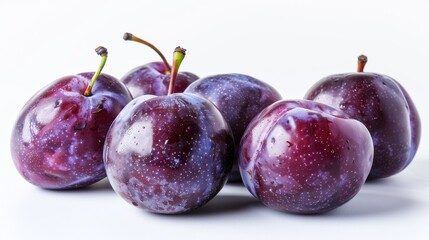 Obraz premium plums lie on a white isolated background space for text