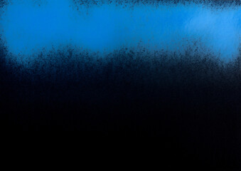 blue color spray paint on black color paper