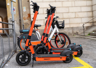electric scooter and electric bicycle rental subscription service in urban parking in city