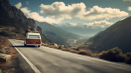 On the Road Again vintage camper van parked on a winding mountain road