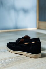 Women's black loafers without a heel for every day. Collection of summer women's shoes. Stylish...