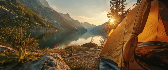 Foto auf Glas Camp tent in front of the mountain lake with sunrise on the background. Banner with copy space © AnaV
