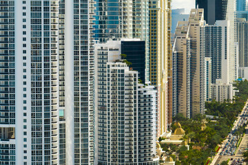 Obraz premium Expensive highrise hotels and condos on Atlantic ocean shore in Sunny Isles Beach city. American tourism infrastructure in southern Florida