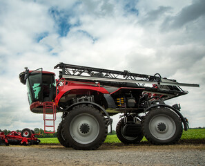 red large self-propelled sprayer with an enlarged wheel suspension system