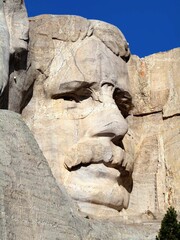 Detail view of the bust of Theodore Roosevelt at Mount Rushmore National Park in the United States of America