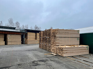 The boards prepared for transportation are in the warehouse. Production of boards. Board warehouse