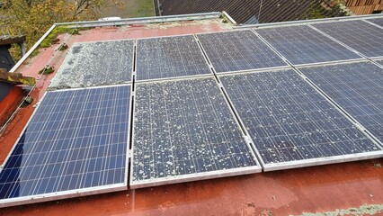 dirty and cleaned solar panels - obrazy, fototapety, plakaty