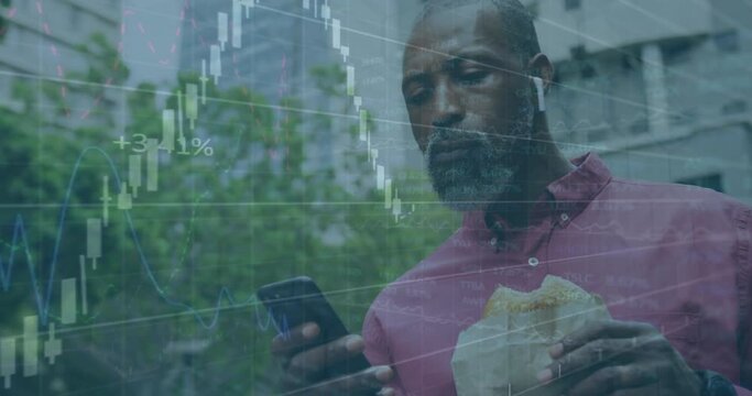 Animation of diagrams with data processing over african american casual businessman using smartphone