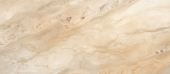 A detailed view of a beige marble textured surface, showcasing the intricate patterns and smooth...