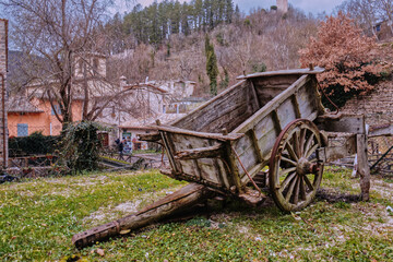 Fototapeta na wymiar A wooden wheelbarrow.