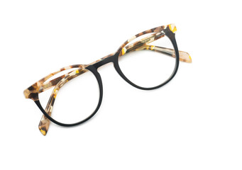 Reading glasses with tortoiseshell frames isolated on white

