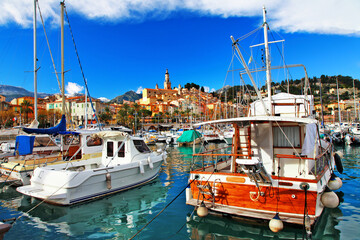 Menton - colorful port town, view with boats - 748333316