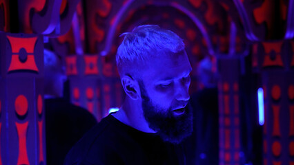 Cool hipster enjoying nightclub music and dancing. Media. Night club dancer hang out at techno...