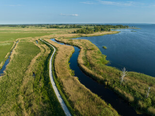 Fototapeta na wymiar Aerial view at Zalew Szczeciński. Shore od Dąbie Lake, Lubczyna, Poland.