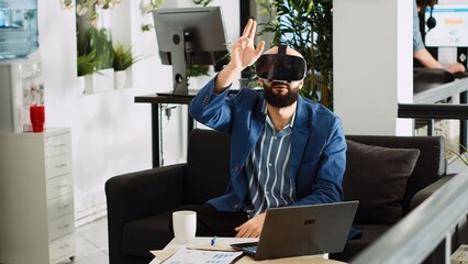AI developer working with vr glasses to create new 3d plan for small business development,...